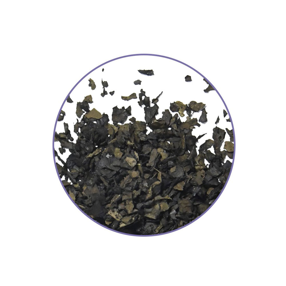 Close-up of McMystic Salvia 40x Extract showing the dried Salvia divinorum extract flakes.